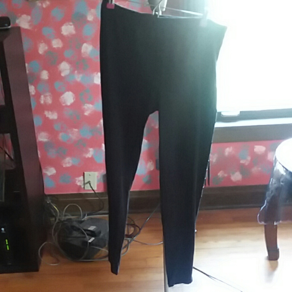 Black leggings with gold studs on the sides